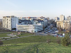 Buildings of Wyżyny at Pileckiego Street in 2020, as seen from the Silent Unseen Park.