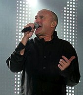 Singer Phil Collins singing