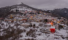 Image of Pigra covered with snow at dusk or early morning.
