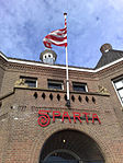 Two monkeys with football with lace (1916), façade Sparta Stadion Het Kasteel, Rotterdam.