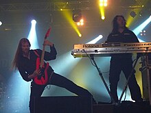 Seppälä to the right and Emil Pohjalainen to the left, on tour with Amberian Dawn in 2009.