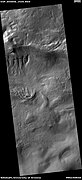Gullies in Noachis quadrangle, as seen by HiRISE under HiWish program Spatulate depressions are visible.