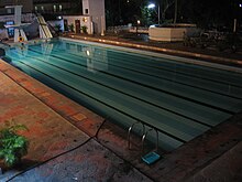 Outdoor swimming pool at night