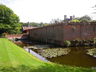 The north west corner of the hall's boundary wall.