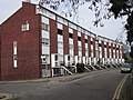 The 20th century version of the crescent terrace. Falconhurst in The Crescent, Surbiton, at the heart of Pooley's development.