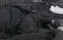 Detail from restored version: 1 of four bodies with unmelted snow in the hand.