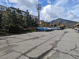 A photograph of a parking lot.