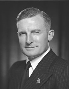 Black and white portrait of man wearing suit