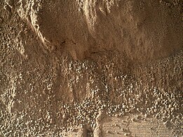"Rocknest" sand on Mars – scoffmark made by the Curiosity rover (MAHLI, October 4, 2012)