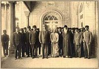 Rabindranath Tagore wearing a karakul hat in a 1932 group photograph in the Majlis of Iran