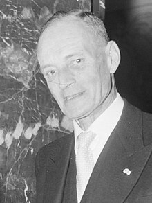 Black-and-white image of a man in a suit