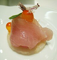 A Japanese-influenced amuse-bouche: hamachi, salmon roe, basil, basil flower