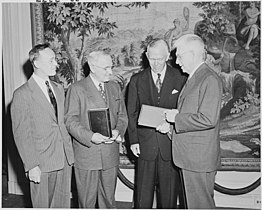 Secretary of Defense Marshall with President Truman and Princeton University President Harold W. Dodds at the Library of Congress. 17 May 1950.