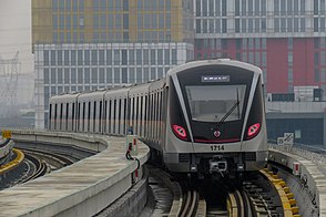 A Line 17 train departs Middle Jiasong Road station, bound for Hongqiao Railway Station station.