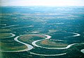 Image 16The Nowitna River in Alaska. Two oxbow lakes – a short one at the bottom of the picture and a longer, more curved one at the middle-right. (from Lake)