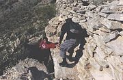 Hikers, Paul, Jose and Tim, on the steep one hundred foot drop trail in Indian Mesa.