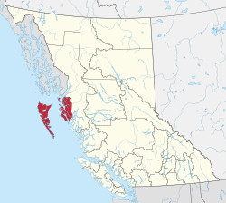 A map of British Columbia depicting its 29 regional districts and equivalent municipalities. One is highlighted in red.