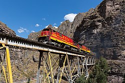 FCCA (Ferrocarril Central Andino) nrs. 1008 and 1009, two GE C30-7, are crossing a steel bridge between Rio Blanco and San Mateo