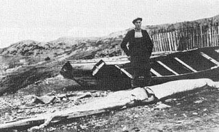 #111 (12/11/1935) Joe Ezekiel of Harbour Main, Newfoundland, with the giant squid he found off Holyrood on 12 November 1935 (see wider view)