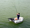 Angling from a small inflatable on Saint-Cassien's lake, France