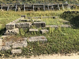 The aqueduct shown behind the Treasury of Cyrene, shored up by a metal framework