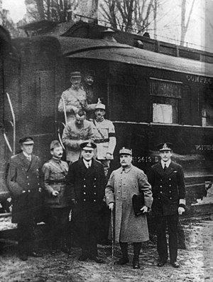 Officials outside the car where the Armistice was signed