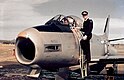 Cadet inspects a Sabre fighter at Amberley c. 1965