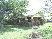 The Sidney B. Moeur House was built in 1921 and is located at 903 S. Ash Ave. Sidney B. Moeur was the son of W.A. Moeur and nephew of Arizona Governor Benjamin B. Moeur. The property is listed in the Tempe Historic Property Register.