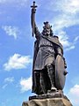Image 67King Alfred the Great statue in Winchester, Hampshire. The 9th-century English king encouraged education in his kingdom, and proposed that primary education be taught in English, with those wishing to advance to holy orders to continue their studies in Latin. (from Culture of the United Kingdom)
