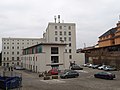 The old courtyard warehouse, gutted, top three floors removed and new staggered storey added (2018)