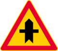 Junction with a minor road (formerly used )