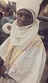 A Hausa boy wearing traditional cloths (Babban riga and rawani)