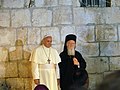 Pope Francis, and Patriarch Bartholomew I in the Church of the Holy Sepulchre, Jerusalem (2014).