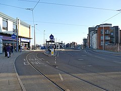 Looking south-east, showing tram stops on the outside and bus stops on the inside