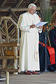 Pope Benedict XVI in white cassock (sometimes though unofficially called a simar) with pellegrina and fringed white fascia (2007).