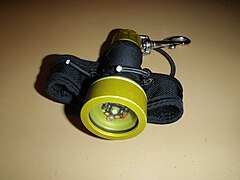 Small dive light on soft Goodman type handle, front view