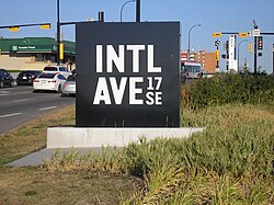 A sign along International Avenue (17 Avenue SE).