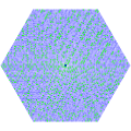 Hexagonal number spiral with prime numbers in green and more highly composite numbers in darker shades of blue.