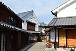 Wooden houses with white walls.