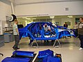 A 2006 Subaru Impreza WRC bodyshell with integrated roll cage