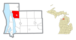 Location within Antrim County (red) and the administered village of Central Lake (pink)