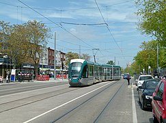 Tram entering the reversing siding; the stop is hidden by the tram