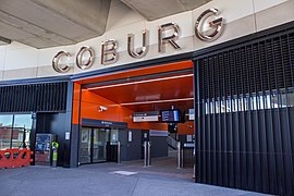 The entrance to the elevated Coburg station with a sign reading 'Coburg'
