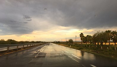 Eastbound Fed. 2 just outside Altar, Sonora, after a summer rain