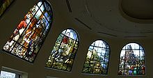 Four highly-detailed stained glass windows.