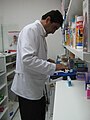 Preparing consumer packaging of prescription drugs at pharmacy