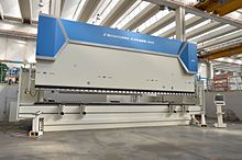 A high-tonnage hydraulic press brake