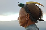 K10. A Nishi tribesman from Arunachal Pradesh wearing traditional headdress with hornbill beak. (WP:Featured Picture)