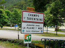Road signs entering Champs-sur-Tarentaine-Marchal, on the D679 road