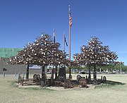 The Glendale Veteran’s Memorial is located at 5959 West Brown Street in Glendale, Arizona. The City of Glendale acquired historical artifacts that were salvaged from the USS Arizona and the USS Arizona Memorial in Pearl Harbor. The rusted metal pieces are from a portion of the potato locker in the ship's galley. The steel rings were cut from the USS Arizona Memorial flagpole. Legislation passed during the administrations of Presidents Dwight D Eisenhower and John F Kennedy designated the remains a national shrine. This is an image of an artifact or piece of a structure that is listed on the National Register of Historic Places in the United States of America. Its reference number is 66000994.